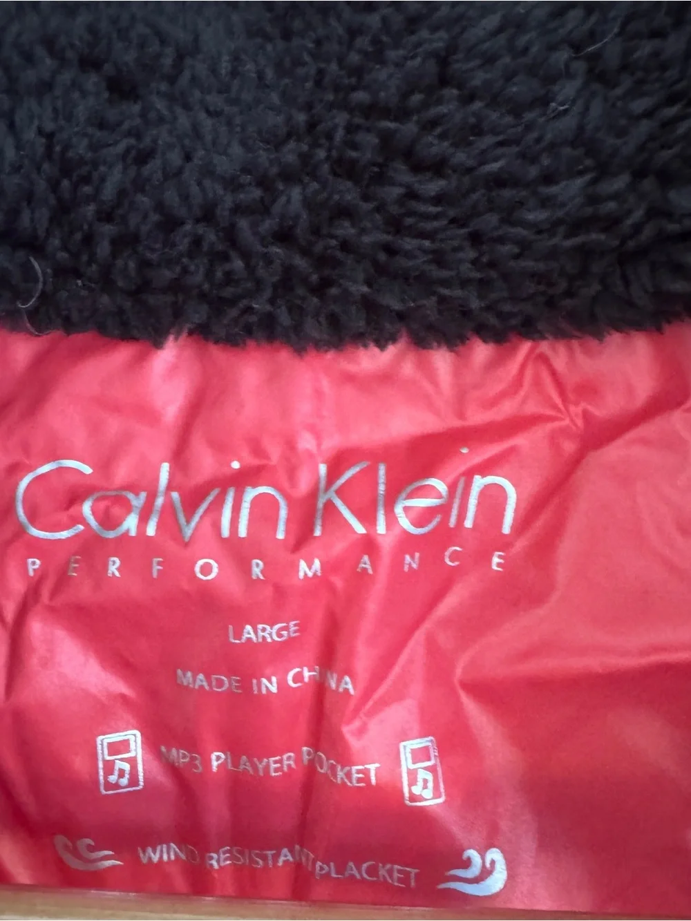 Calvin Klein Performance Red Quilted Vest with Black Collar Trim